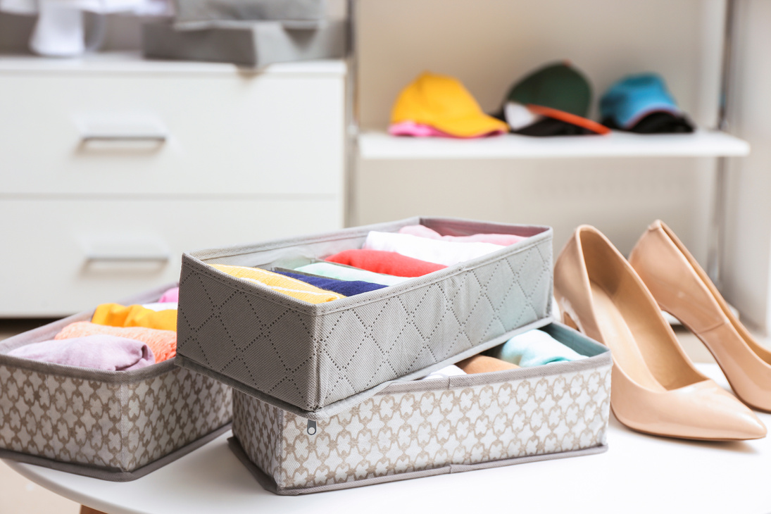 Organizers with Clean Clothes in Closet